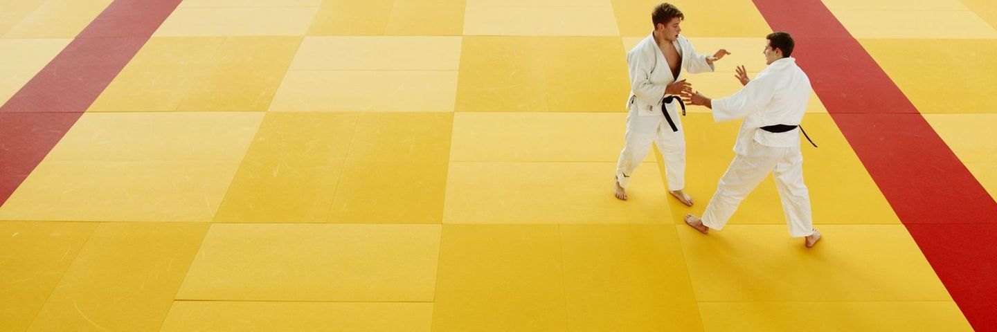 Two kids in a youth martial arts class