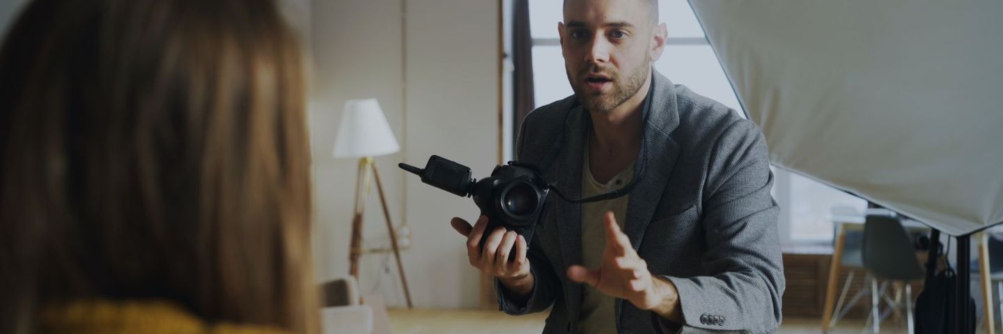 A photographer shooting a portrait session